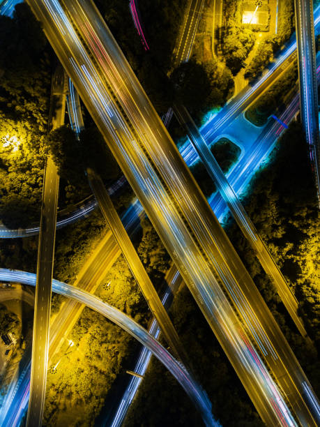 istock Aerial highway junction at night time 896492100