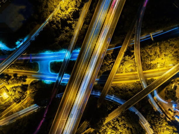 istock Aerial highway junction at night time 896492110