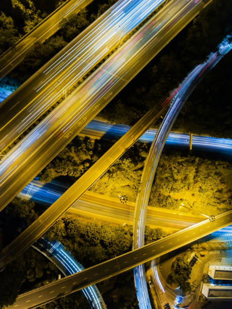 istock Aerial highway junction at night time 896492118