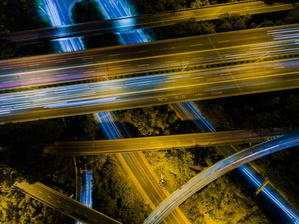 istock Aerial highway junction at night time 896492144