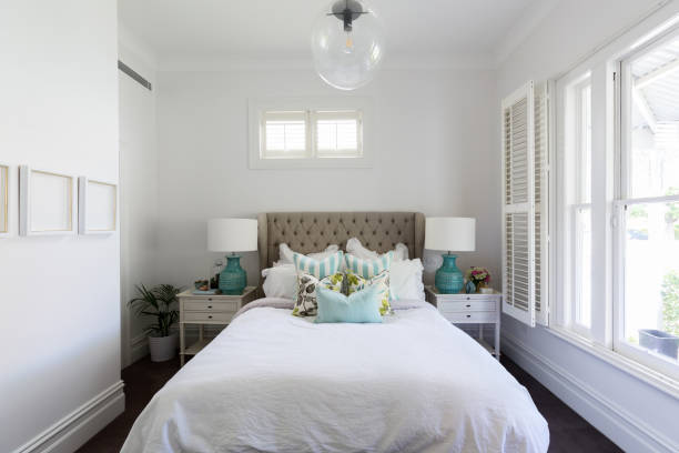 istock Beautiful feminine country styled master bedroom 896492402