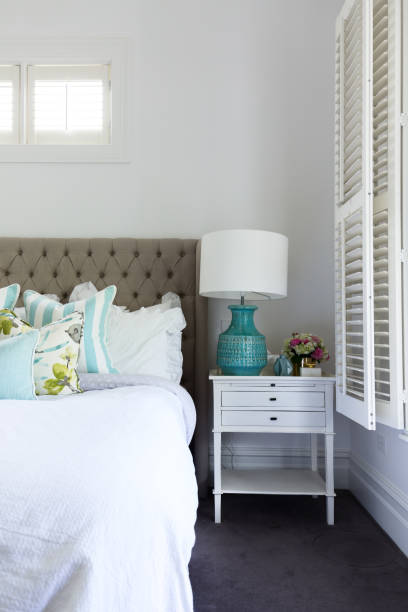 istock Side table details in a luxury country styled bedroom 896492410