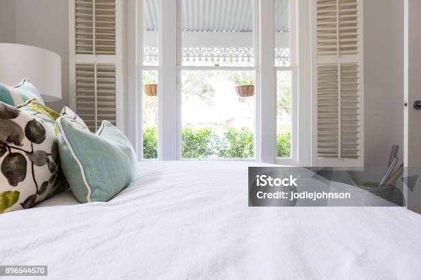 View Of The Garden From A Luxury Styled Master Bedroom Stock Photo - Download Image Now