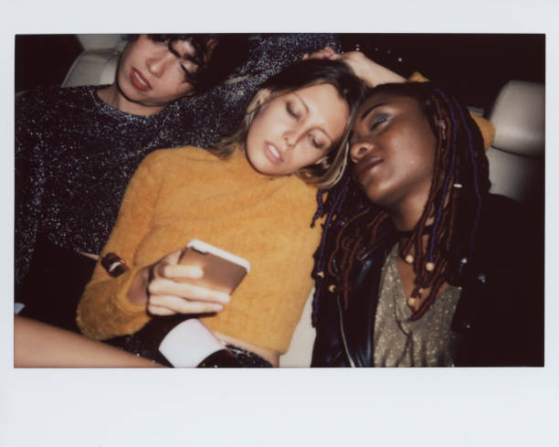 istock Diverse women in a backseat of a cab 896551146