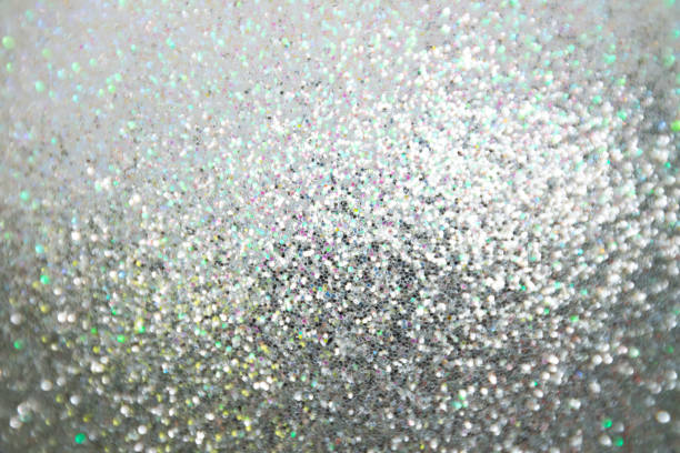 istock Abstract blurred bokeh of siver grey twinkled glitter use for christmas background. 896558152
