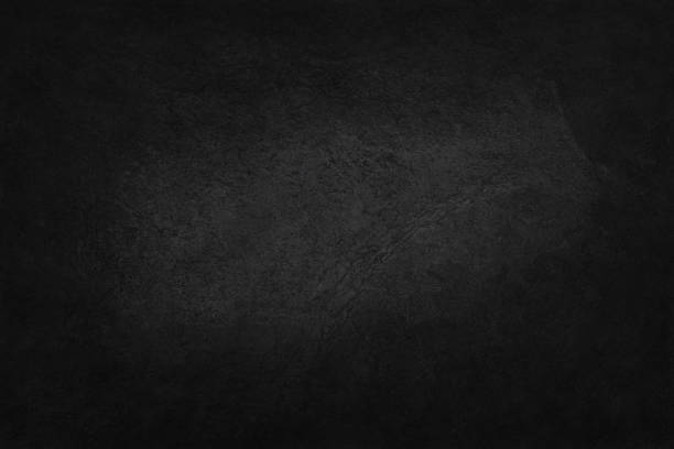 istock Dark grey black slate texture in natural pattern with high resolution for background and design art work. Black stone wall. 896558162