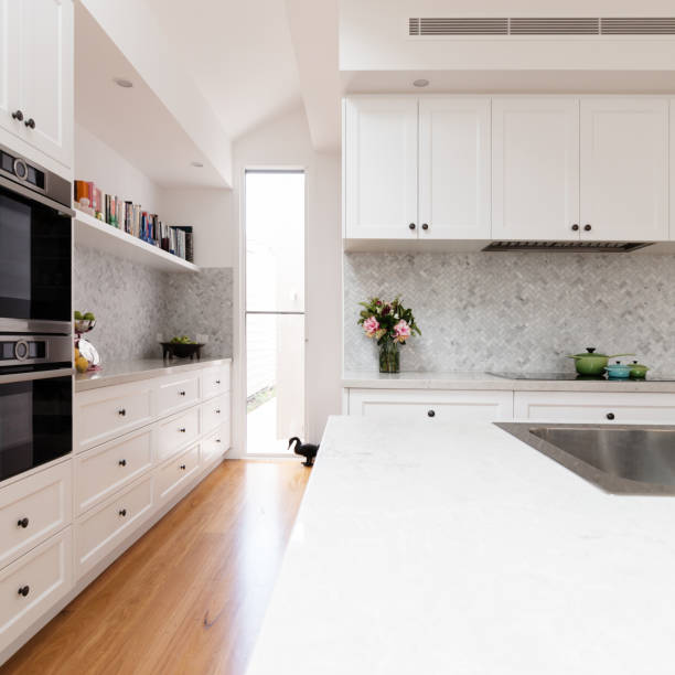 istock Renovated classic contemporary style kitchen in white and grey tones 896563824