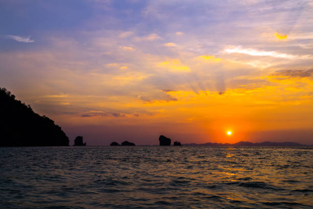 istock Abstract Sunset on a sea, fantastic sky clouds background 896566524