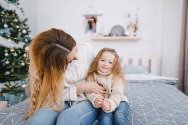 istock mother and daughter playing 896567446