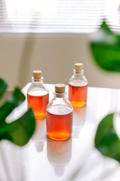 istock Glass can full of honey on table. 896586288