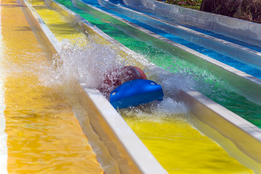 Colorful Sliders in the water park, Water spray battle zones aquapark.