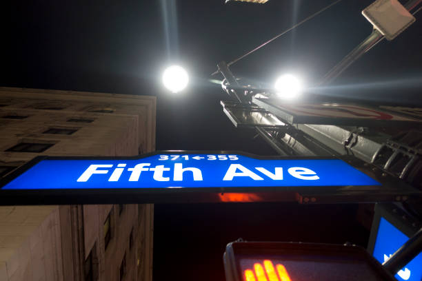 istock Manhattan 5th ave lighted street signs blue and white 896591950