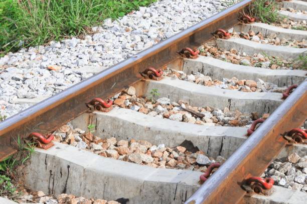 railway track on gravel for train transportation - connection merger road togetherness imagens e fotografias de stock