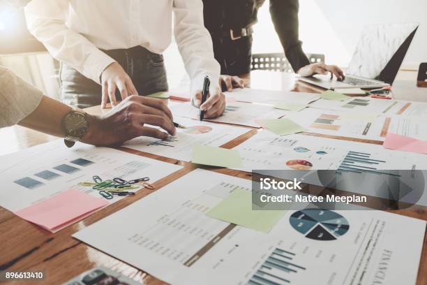 Business People Analyzing Statistics Business Documents Financial Concept Stock Photo - Download Image Now