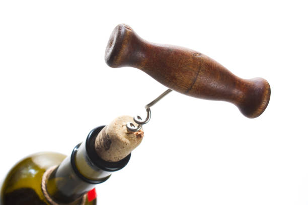 istock bottle of wine with a corkscrew 896618754