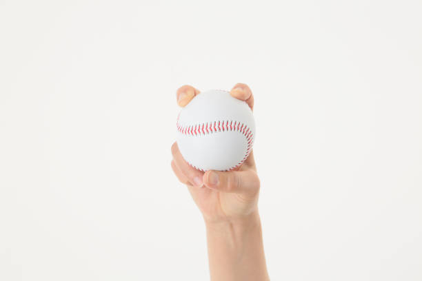 istock Hand with baseball ball 896634802