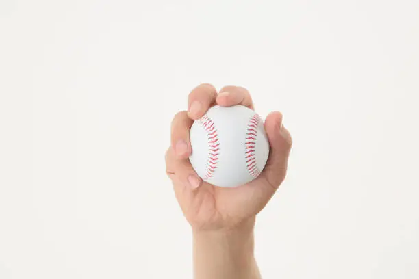 Photo of Hand with baseball ball