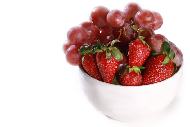 istock a bowl with strawberry and grapes 896651750