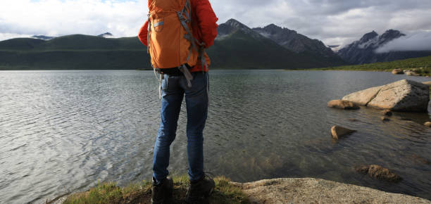 istock young backpacking woman hiking in mountains 896651966
