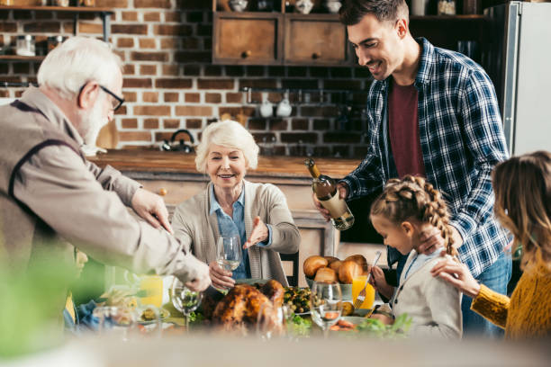 istock family having holiday dinner 896658870