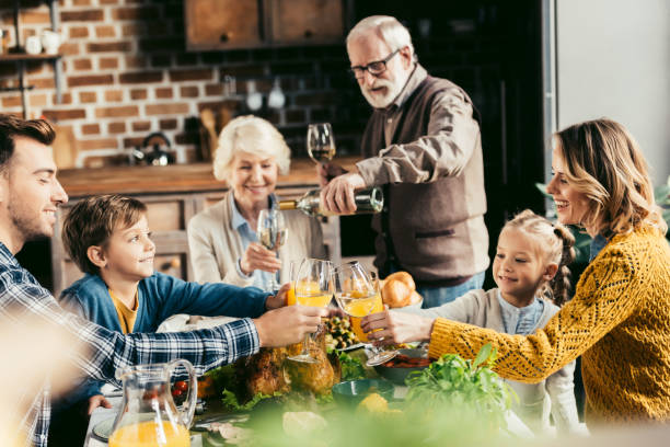 istock family having holiday dinner 896658964