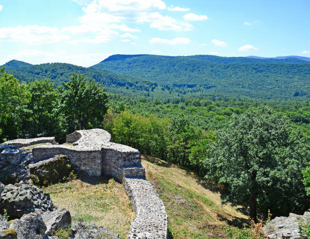 istock Old ruin with mountains in Hungary 896667678