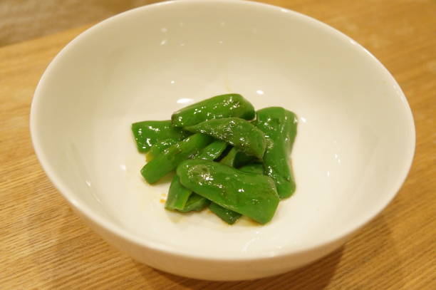 istock Stir-fry of green pepper 896676206