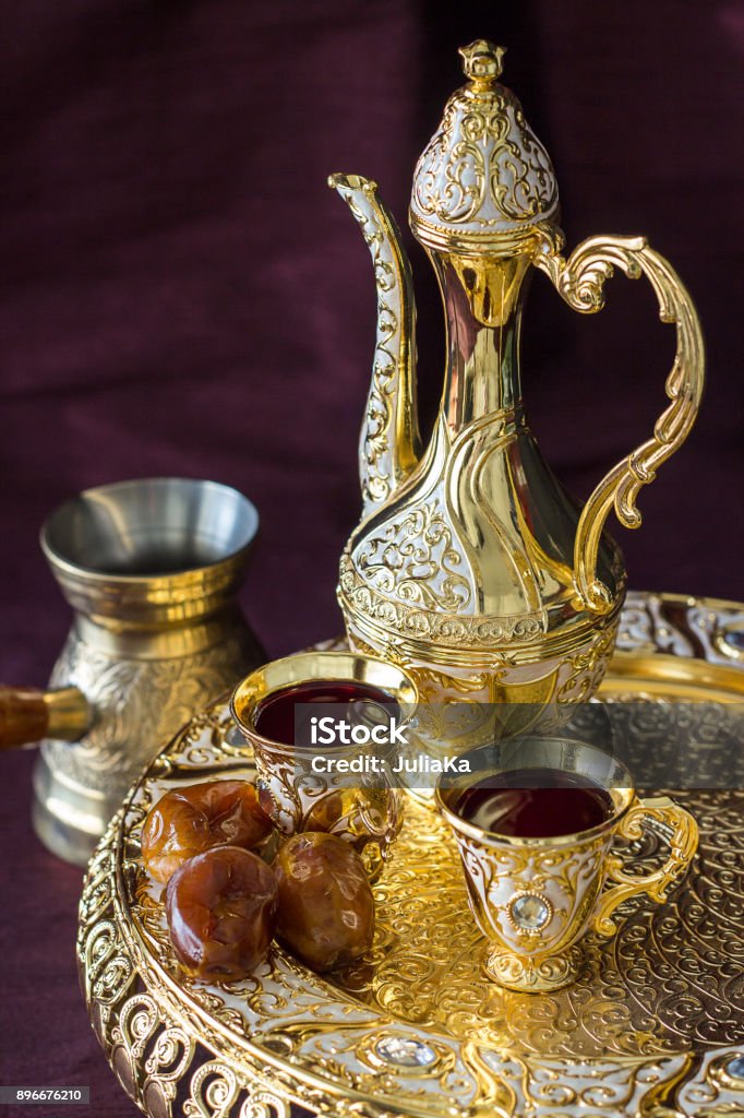 Regional Food Backgrounds Traditional Golden Arabic Coffee Set With Dallah Coffee  Pot And Dates Dark Background Vertical Photo Stock Photo - Download Image  Now - iStock