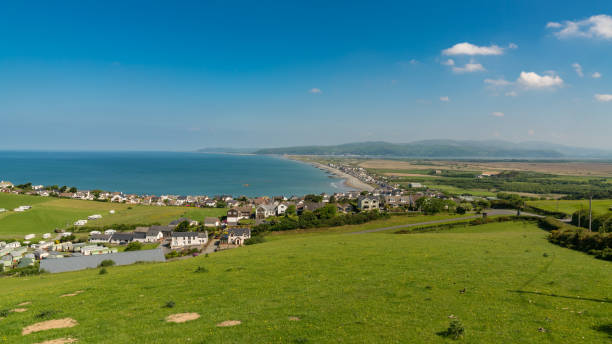 View towards Borth, Wales, UK View over the Welsh coastline towards Borth, near Aberystwyth, Ceredigion, Wales, UK cardigan wales stock pictures, royalty-free photos & images