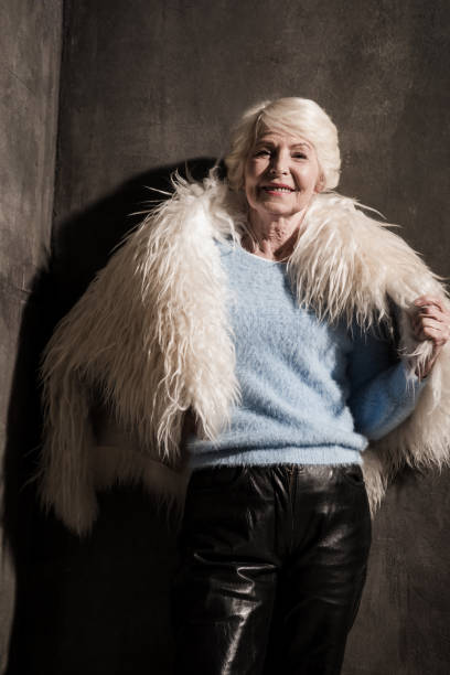 istock senior woman in fur coat 896698194