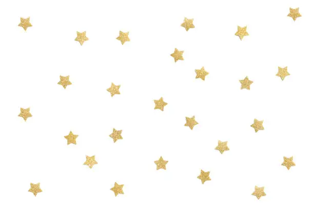 Photo of Gold glitter star paper cut on white background