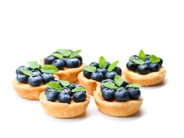 istock puff  pastry stuffed with soft curd with blueberries on white background 896715914