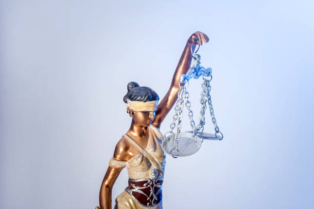 istock statue of justice isolated on white 896725200