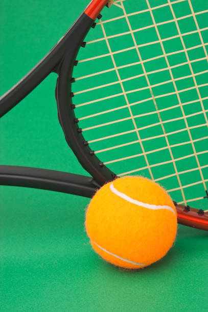 istock tennis racket and a ball 896727016