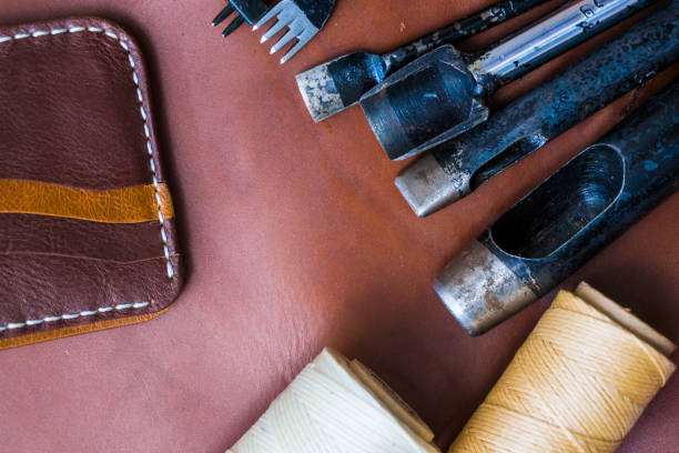 istock Handmade of genuine leather wallet bifold on craftsmanship tool 896734062
