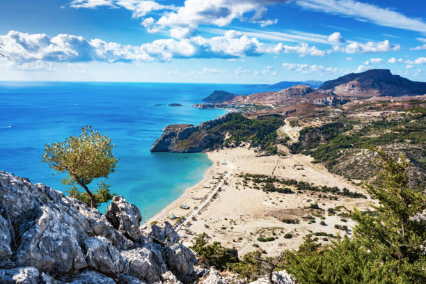 istock Tsambika beach with golden sand - view from Tsambika monastery (RHODES, GREECE) 896734458