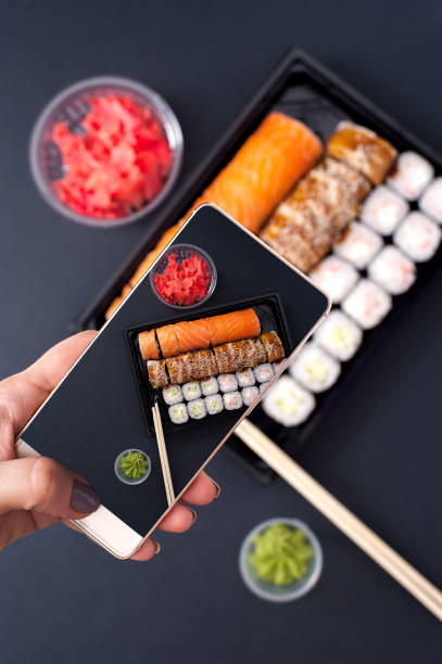 istock Sushi rolls set with wasabi, ginger and chopsticks 896741728
