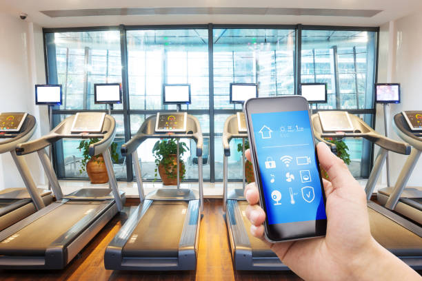 istock smart phone with smart home with modern gym 896746324