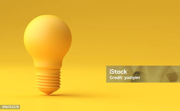 Minimal Idea Design Concept Yellow Bulb On Yellow Pastel Background Stock Photo - Download Image Now