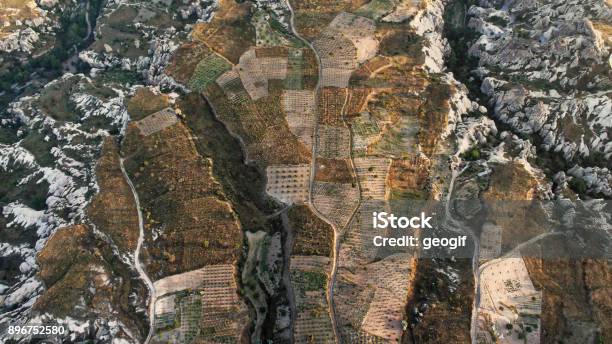 Aerial View Of Small Vegetable Fields Between The Craggy Cliffs Of Cappadocia Anatolia Turkey Stock Photo - Download Image Now