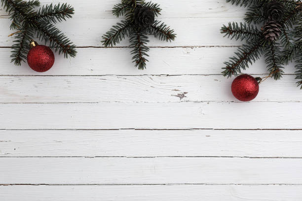 istock New Year's background. Spruce branches on a wooden table. Orname 896752858