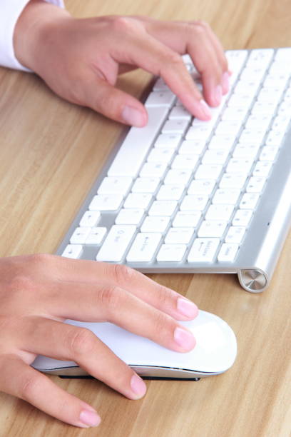 istock Female hand typing with keyboard 896752936