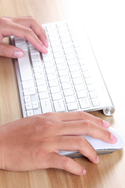 istock Female hand typing with keyboard 896752940