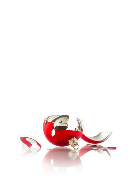 istock Christmas. Broken red christmas ball isolated on white 896755264