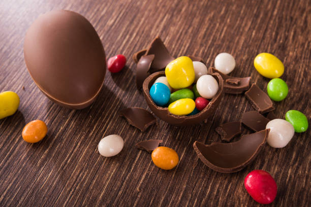 istock easter dessert tasty chocolate egg with color candy 896755808