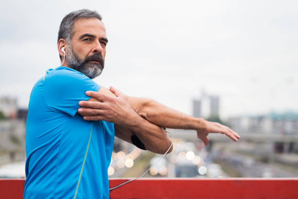 istock Man jogging outdoors 896761390