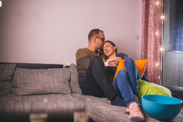 istock Young couple at home 896761646