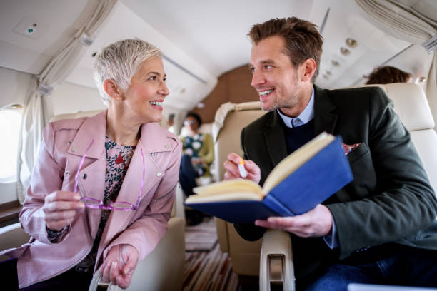 istock Business people in private jet airplane 896762004