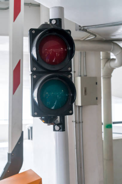 istock Red and green traffic light in parking lot or building 896762062