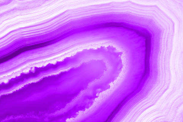 istock Ultra violet pruple agate mineral cross section. Abstract background 896768494